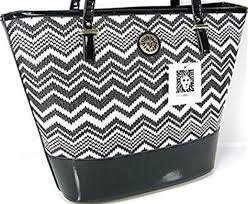 This zoo logo looks like a simple tree at first glance. Purse With Lion Logos