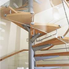 The combination of white metal and wood in spiral staircase impressed well into modern style. China Timber Stairs Tread Staircase Guangzhou Spiral Staircase China Staircase Spiral Staircase