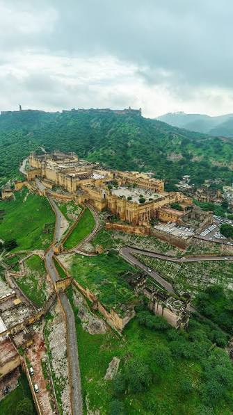 Amer Fort in Summer:, Bold. Blazing. Breathtaking., Amer Fort in Monsoon:,  Drizzling. Dreamy. Divine., One Fort. Two Moods., Which one are you falling  for?, #AmerFort #AmerinMonsoon #Monsoon ...