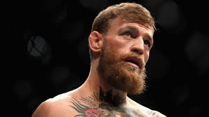 Irishman conor mcgregor became the biggest star in the sport of mixed martial arts while claiming the ultimate fighting championship's featherweight and lightweight titles. Ufc 2021 News Conor Mcgregor Suspended Leg Injury Dustin Poirier Ufc 257 Crutches Return Trilogy Fight Fox Sports