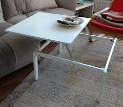 They are cocktail tables that convert, alter, or shift into a particular form. Minimalist Height Adjustable Rotating Coffee Table Ikea Hackers