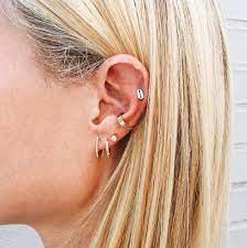 Double Ear Piercing Ear Mapping Where To Get Pierced Goop Second Ear Piercing Ear Piercings Ear Piercing Studs