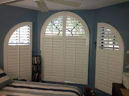 Check spelling or type a new query. Curved Windows Can Be Covered With Custom Shutters To Fill The Entire Opening As Pictured Here Or Typica Curtains With Blinds Living Room Blinds House Blinds