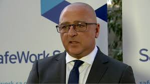 South Australian police and infrastructure departments charged over death  of cook in freezer