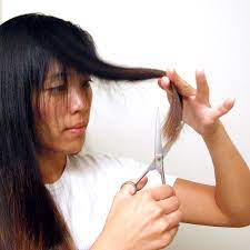 The first thing you need to cut your hair at home is good scissors and a comb. A Diy Layered Haircut How To Cut Your Hair At Home Ashley C Chin