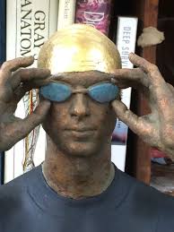 Clarity (Male Swimmer in Wet Suit Standing sculpture)' by Deon Duncan