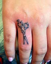 Adorn your wrist with such attractive designs! Small Finger S Scissor Tattoo Tattoomagz Com Tattoo Designs Ink Works Gallery Tattoo Desig Cosmetology Tattoos Hairdresser Tattoos Hairstylist Tattoos