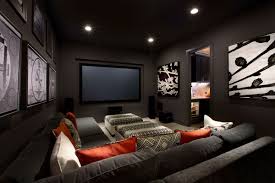 A home theater or a family room with a large screen is a great addition to your house design. Ideas On How To Make The Most Of Your Home Media Room Small Media Rooms Home Cinema Room Media Room Colors