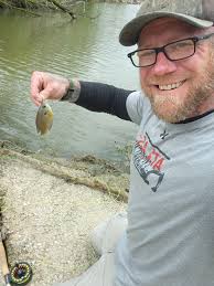 Ponds in central Iowa with low vegetation for fly fishing?