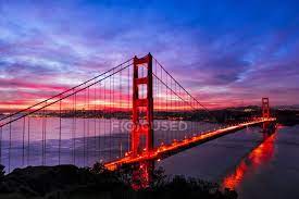 Times for san francisco, ca Golden Gate Bridge Lit Up At Sunset San Francisco California United States Urban Scene Evening Stock Photo 263279602