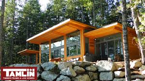 Inside, the studio kept things simple and cozy with a double bedroom, a bathroom, and a living room and a kitchen in the center. Contemporary West Coast Style Custom Homes Tamlin Homes Timber Frame Home Packages