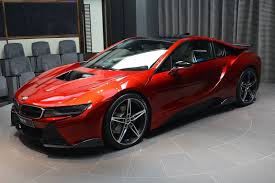 Lava Red Bmw I8 Arrives At Abu Dhabi Showroom Bmw I8 Bmw Sports Cars Luxury