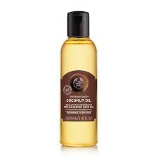 Coconut oil is the holy grail of haircare: Coconut Oil Brilliantly Nourishing Pre Shampoo Hair Oil Hair The Body Shop