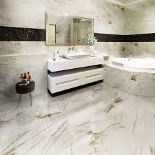 In this bathroom, the entire shower enclosure is marble. Italian Porcelain Tiles Marble Effect Stonesuperstore