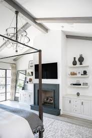 By definition, the master bedroom is usually the largest one in the house but there are also other elements that capture the essence of the concept. Fireplace In The Master Bedroom With A Tv Over It And Built Ins On Either Side Canopy Bed Master Bedroom Interior Bedroom Addition Master Bedroom Addition