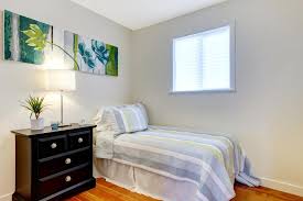 Kristi's makeover livened up the small bedroom with a floral headboard, new curtains, and a sunburst mirror. How To Do A Small Bedroom Makeover The Easiest Way My Decorative