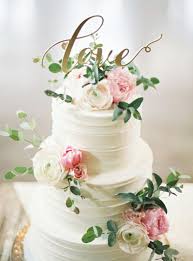 White Floral Cake With Love Signage Wedding Party Ideas Wedding Cake Fresh Flowers Floral Wedding Cakes Floral Cake Topper