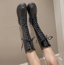 The singer adds a modern take to the boots adding his own style and rock aesthetic to the look. Normcore Studios Black Grunge Aesthetic Chunky High Combat Boots