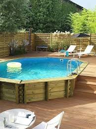 Anda Dapat Menemukan Banyak Cara Untuk Secara Kreatif Membuat Kolam Tanah Di Atas Anda Cocok In 2020 Pool Deck Plans Swimming Pool Decks Above Ground Pool Landscaping