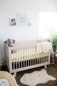 Project Nursery Modern Boho Nursery With A Punch Of Tropics Natural Wood Crib With Lemon Sheet Boho Nursery Wood Crib Nursery Inspiration
