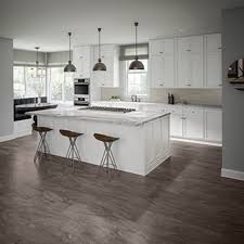 The floor features 12x24 tiles in the color blanc. How To Install Tile American Olean