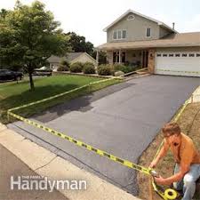 Run a hose at the top of your driveway to determine where the water runs. Repave Your Driveway For Instant Curb Appeal Diy
