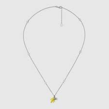 Why is noone looking at the necklace closely and seeing that it's not a banana. Interlocking G Necklace With Banana In Sterling Silver Gucci Us