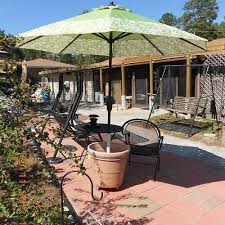 Pipe, depending on the diameter of your umbrella pole. Umbrella Holder In A Cement Plant Container Hometalk