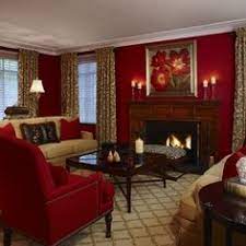 Art hangs from a white wall accented with white moldings over a cream velvet curved sofa topped with gray pillows. 28 Best Red And Cream Living Rooms Ideas Living Room Designs Living Room Decor Cream Living Rooms