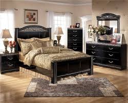 E king panel bed, dresser, mirror, 1 nightstand, chest. Constellations Bedroom Set Ashley Furniture