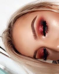 Warm Red Orangey Tones Are In This Season Find Out More On The Article About Sunset Eye Makeup Trends Red Makeup Eye Makeup Makeup Looks