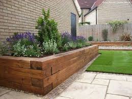 17 Fascinating Wooden Garden Edging Ideas You Must See The Art In Life Wooden Garden Edging Backyard Landscaping Backyard