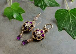 Check out our purple and gold earrings selection for the very best in unique or custom, handmade pieces from our earrings shops. Blossom Drop Earrings Violet Edera Jewelry Heirloom Lace Bridal Accessories