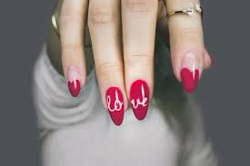 Red Nail Designs Paint the nails a red base coat then you use a brush to outline the complete nail.