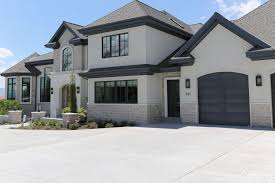 Modern stucco house colors today include base colors paired with different trim colors such as pewter or a gray base with white trim, a stark black base with white trim, or a pure white base with black trim. Beautiful European Contemporary Home Tour Brick Exterior House White Stucco House White Exterior Houses