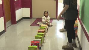 Beaufort County elementary collects cereal boxes for WNC in true domino  effect of kindness