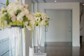 Tall Glass Vase Altar Pieces With Stunning White Flower Arrangement Modern Wedding Cerem White Flower Arrangements Tall Glass Vases Modern Flower Arrangements