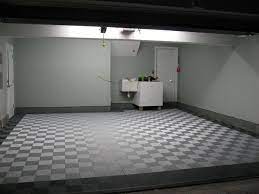 When manufacturers began offering a variety of colors and textures, the surfaces quickly showed up in the garages of car buffs, home gyms, and fitness centers. Perimeter Design Garage Ribtrax Pearl Silver Jet Black Garage Floor Garage Interior Flooring