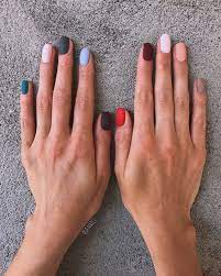 The idea of matte nail polish may not be everyone's choice but it does throw up great interesting options. Matte Finish Nail Polish Every Nail A Different Color In Matte Finish Minimalist Nails Nails Rainbow Nails