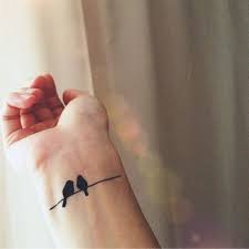 Bird On A Wire Meaning Birds On Wire Bird Tattoo Wrist Simple Bird Tattoo Birds Tattoo