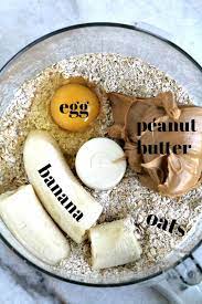 Ingredients For Peanut Butter Banana Dog Treats In Food Processor Bowl Dog Biscuit Recipes Healthy Dog Treats Homemade Easy Dog Treat Recipes