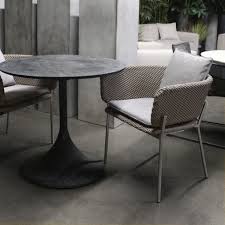 Urban And Industrial Concrete Bistro Table And The Cyprus Dining Chair Never Made Outdoor Dining Seem Cooler This Pair Goes Beyond The Co