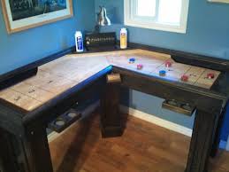 Corner Shuffleboard Table Not Even Sure How This Works But It Looks Cool Shuffleboard Table Game Room Bar Shuffleboard Table Diy