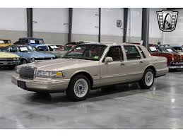 Image result for Light Prairie Tan 1997 Town Car