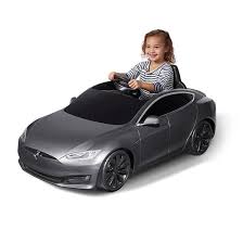 How gorgeous and fun is this power wheels pink barbie quad for girls? Tesla Model S For Kids