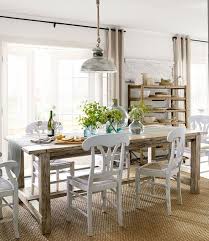 This beach style space also has shabby chic touches from the accessorize and centerpiece. Coastal Dining Room Tuvalu Home