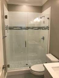 8x24 Smooth Wall Tile Makes For Less Grout And A Clean Look For Your Shower Walls Cera Diy Bathroom Design Bathrooms Remodel Frameless Glass Shower Enclosure