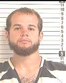 Fire intended for 'jailhouse cigarette,' tattoo device leads to arson charge