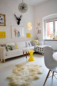Accent wall with wooden tiles creates a homey feeling 25 White Brick Walls That Are Anything But Boring Shelterness