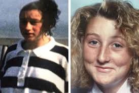 Family's 'horror' as flowers taken from grave of two young sisters